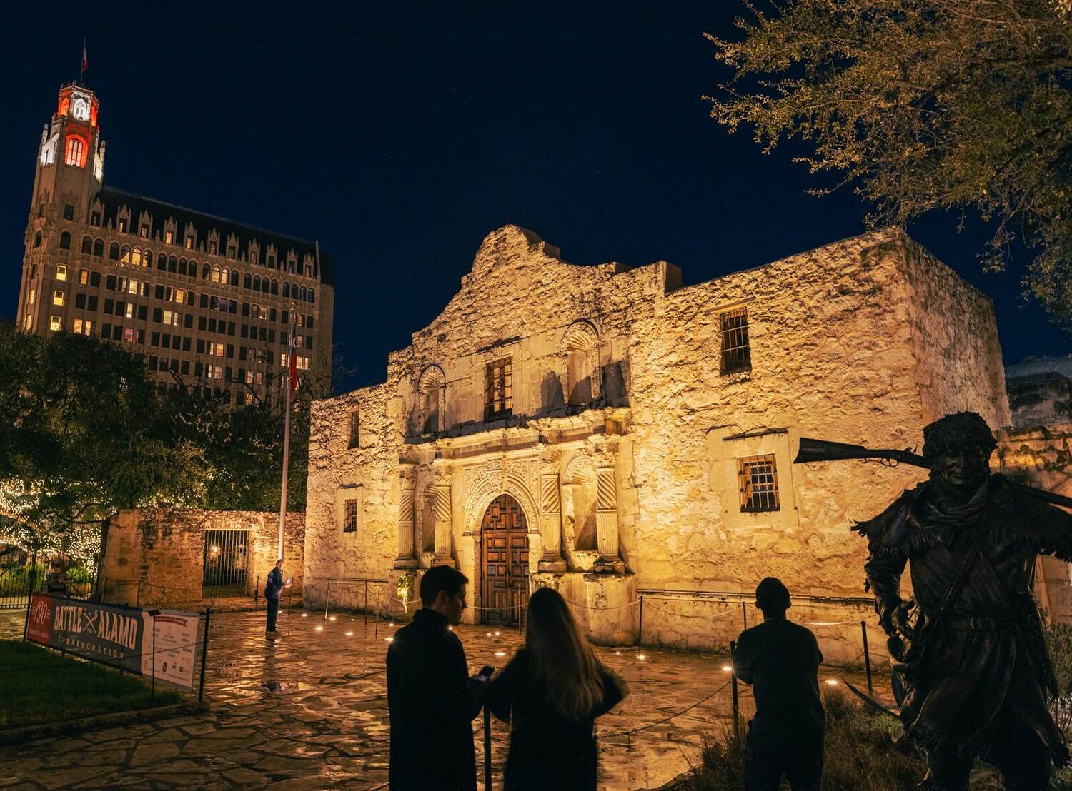 The Alamo lit at night