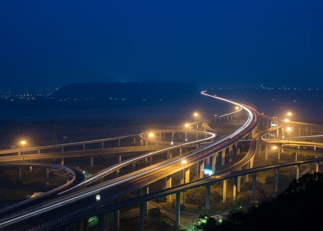 Lit expressway interchange at night