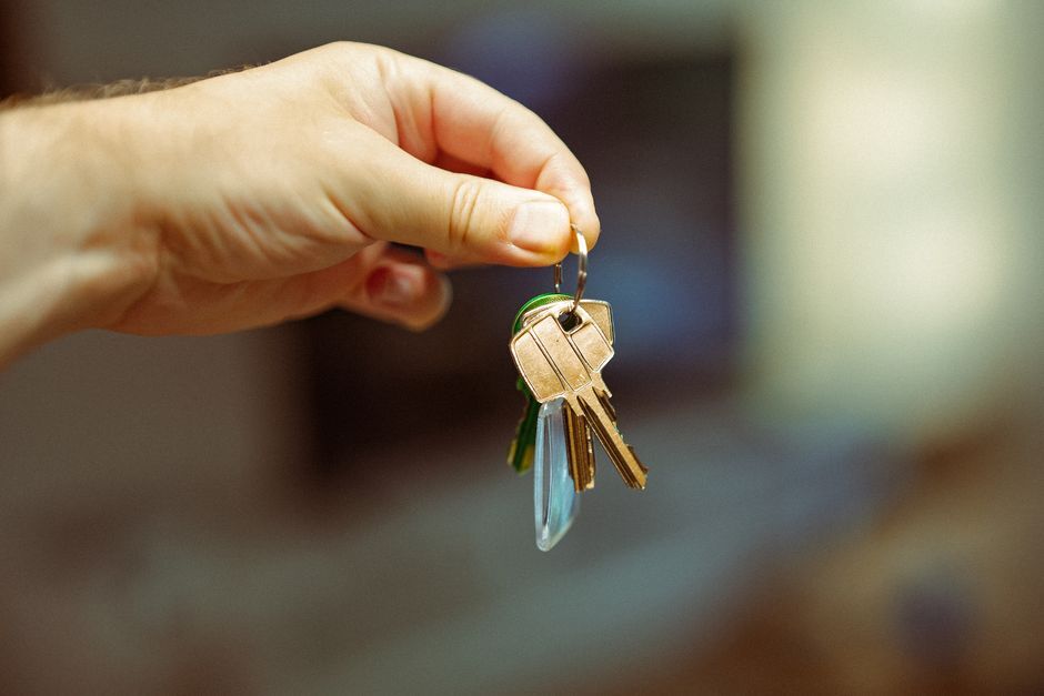 Hand holding a set of keys