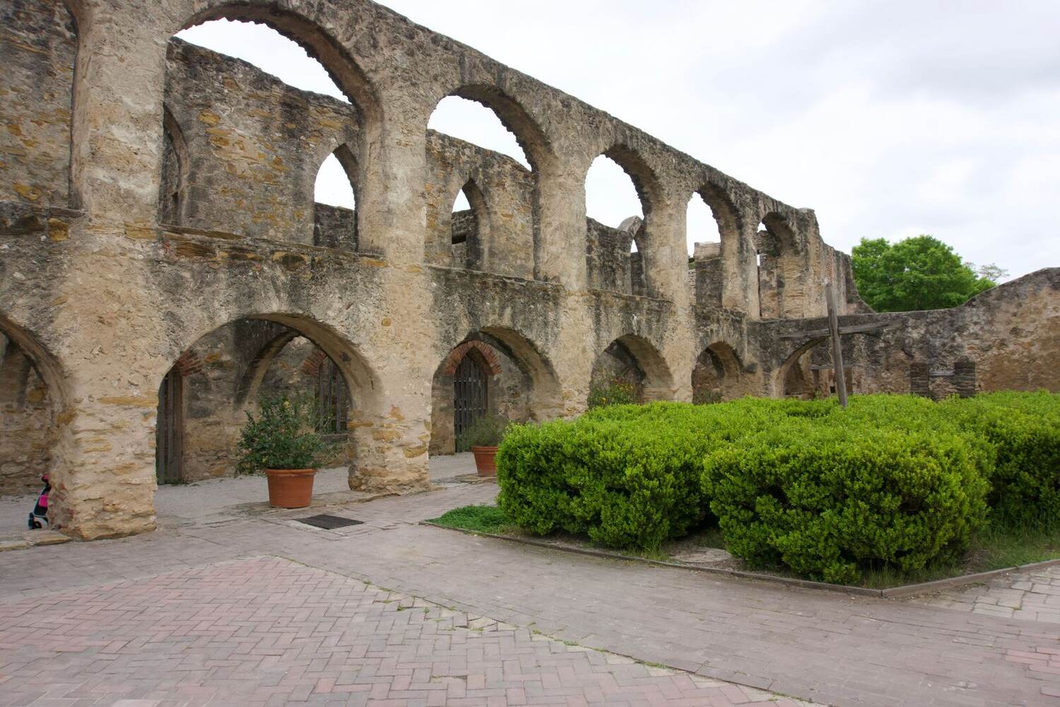 Two-story stone arches at a historic San Antonio mission